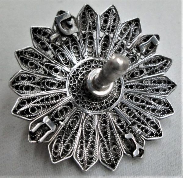 Handmade sterling silver  dreidel Yemenite filigree sunflower shape set with a Malachite stone at peak. Made by S. Ghatan (Katan).