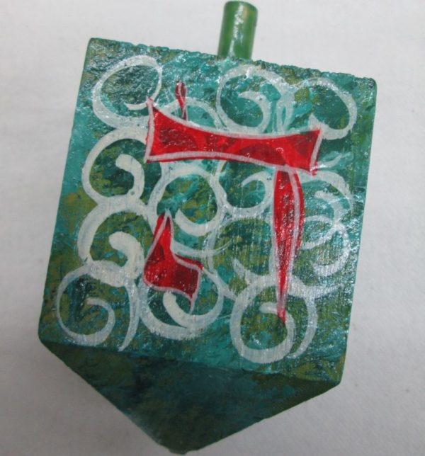 Hanukah Dreidel Painted Wood Sevivon hand painted with green background and designs. Dimension 5 cm X 5 cm X 10 cm approximately.