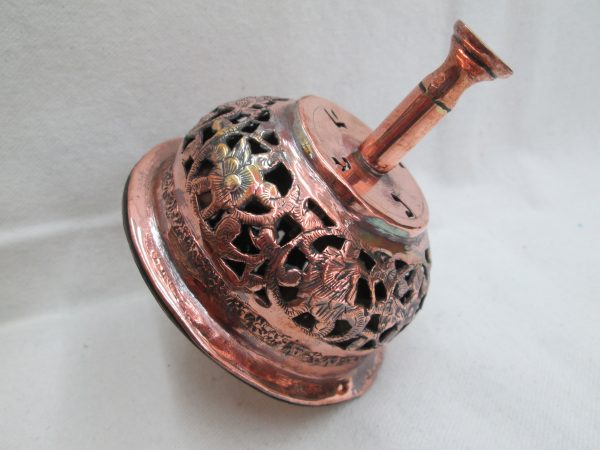 Copper Hanukah Dreidel Grogger a combined handmade and hammered & cut out floral designs. Made in Israel early 1950’s. Very rare item.