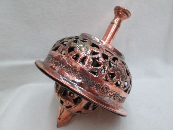 Copper Hanukah Dreidel Grogger a combined handmade and hammered & cut out floral designs. Made by S. Ghatan Katan from Jerusalem.