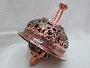 Copper Hanukah Dreidel Grogger a combined handmade and hammered & cut out floral designs. Made in Israel early 1950’s. Very rare item.