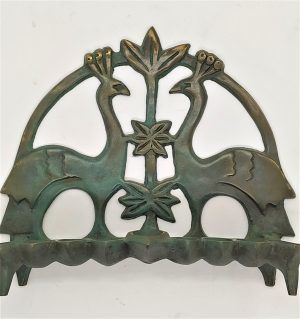 Handmade Menorah bronze two  peacocks with green patina spread over made by Shaul Baz. Can be either for candles or oil lighting.