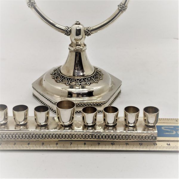 Handmade sterling silver Menorah Sabbath candlesticks, can be used for both events . Decorated with fine Yemenite filigree around base.