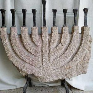 Menorah Sculptured Jerusalem Stone handmade by B. Dov. Handmade Menorah sculptured Jerusalem stone with casted iron candle holders.