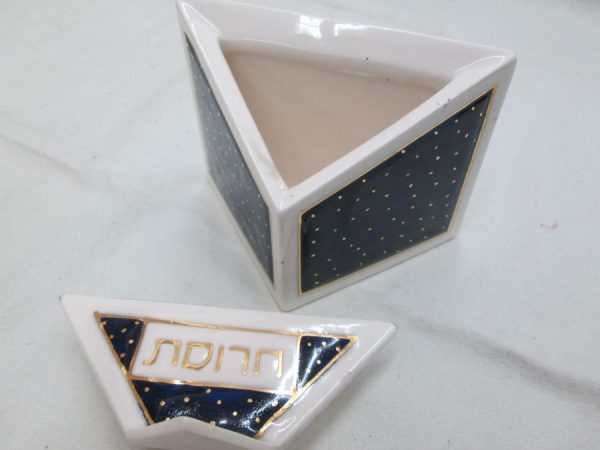 Contemporary style Passover Haroset dish blue Ceramic triangle shape blue & white colors. Dimension 9.7 cm X 5.cm X 7.7 cm approximately.