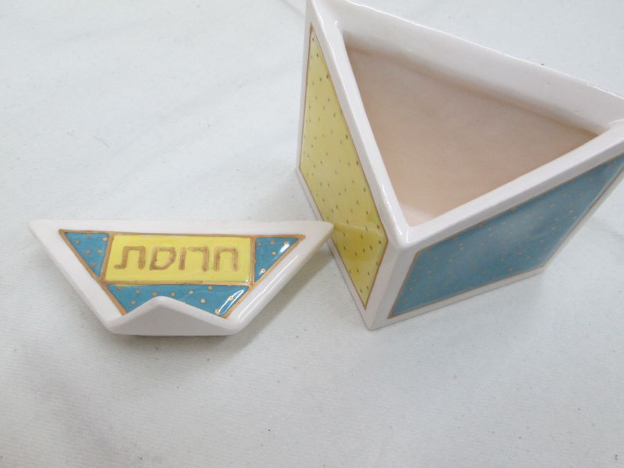 Contemporary style Passover Haroset dish yellow Ceramic triangle shape blue, yellow & white colors. Dimension 9.7 cm X 5.cm X 7.7 cm approximately.