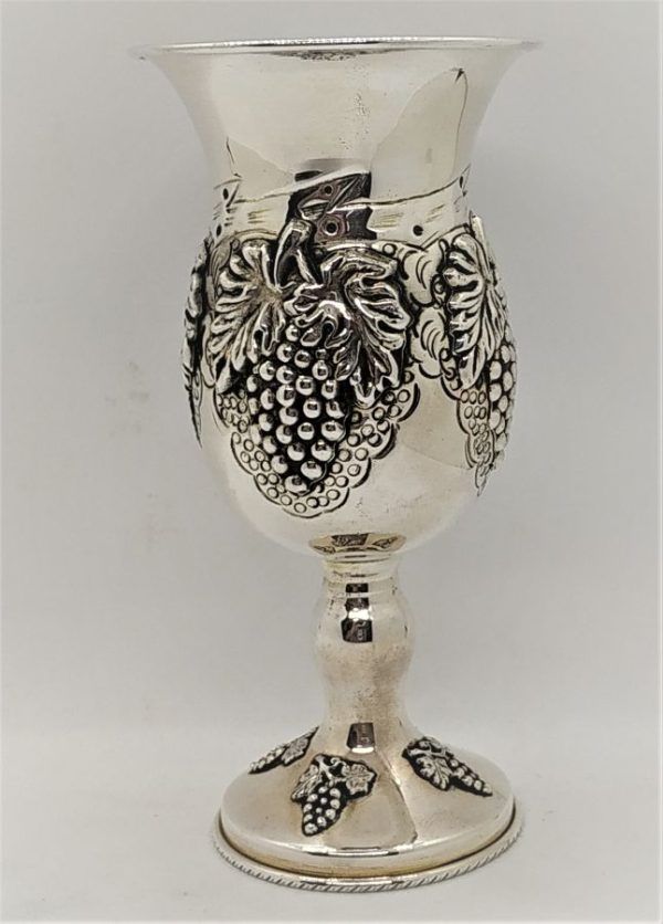 Silver Grapes Kiddush Cup handmade. Sterling Silver Kiddush Cup Grapes designs embossed all around cup. Dimension diameter 7 cm X 14.2 cm approximately.