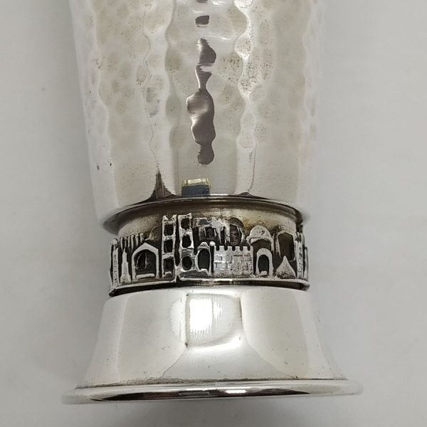 Sterling Silver Kiddush goblet Jerusalem design with hand hammered designs around & Jerusalem houses around borders diameter 6.6 cm X 12.3 cm approximately.