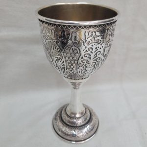 Sterling silver Kiddush goblet etching designs of the seven species of the holy land Israel & grapes all around, diameter 8 cm X 16 cm approximately.