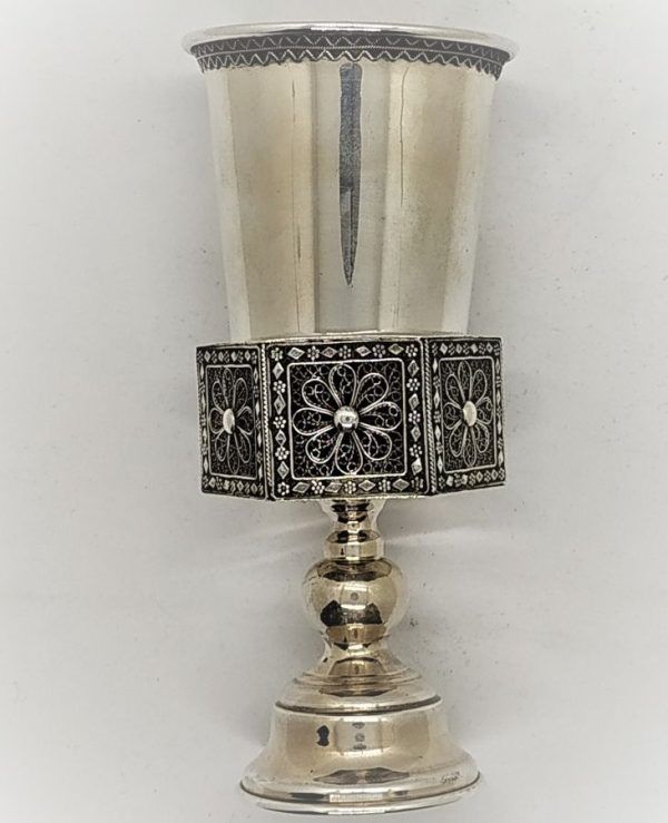 Silver Kiddush Cup Holder and cup. Sterling Silver Kiddush Cup Holder with Yemenite filigree design cup holder. Dimension diameter 7.2 cm X 15.2 cm.