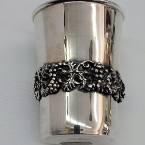 Sterling silver grapes Kiddush cup with grape leaf around cup contemporary style made by Bier from Jerusalem diameter 6.3 cm X 8.3 cm approximately.