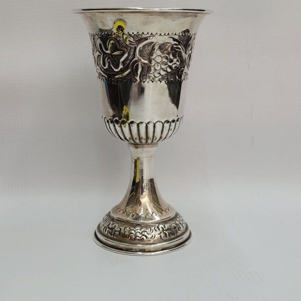 Sterling Silver Kiddush Cup Grapes designs around borders. 24 carat gold plating inside Kiddush cup to prevent spoiling wine taste.