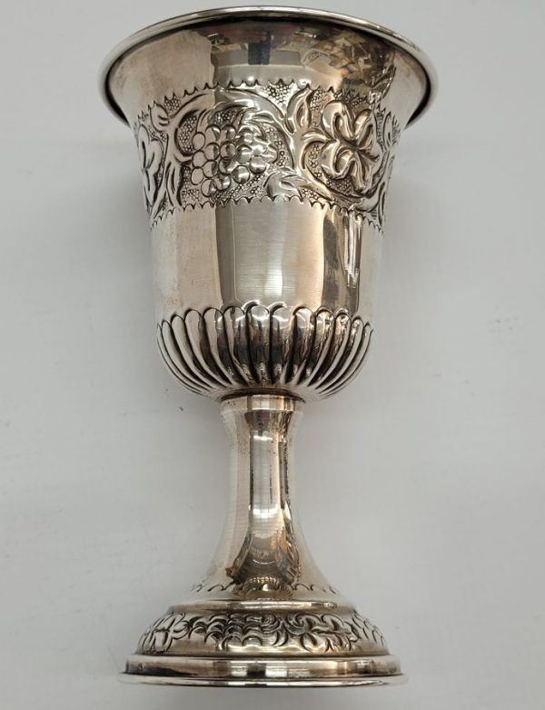 Sterling Silver Kiddush Cup Grapes designs around borders. 24 carat gold plating inside Kiddush cup to prevent spoiling wine taste.