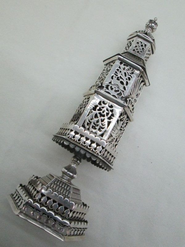 Havdalah sterling silver tower spice box heavy tower with silver cut out flowers & doves designs around 7 cm X 7.9 cm X 24 cm approximately.