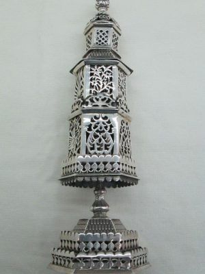 Havdalah sterling silver tower spice box heavy tower with silver cut out flowers & doves designs around 7 cm X 7.9 cm X 24 cm approximately.