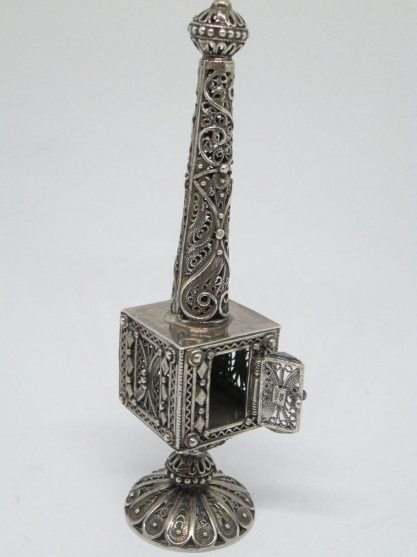 Handmade Yemenite filigree Havdalah box tower with silver Yemenite filigree designs around. Dimension 3 cm X 3 cm X 13 cm approximately.