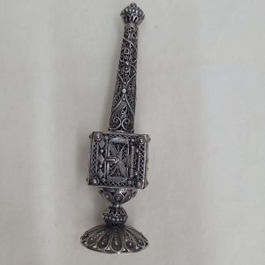 Handmade Yemenite filigree Havdalah box tower with silver Yemenite filigree designs around. Dimension 3 cm X 3 cm X 13 cm approximately.