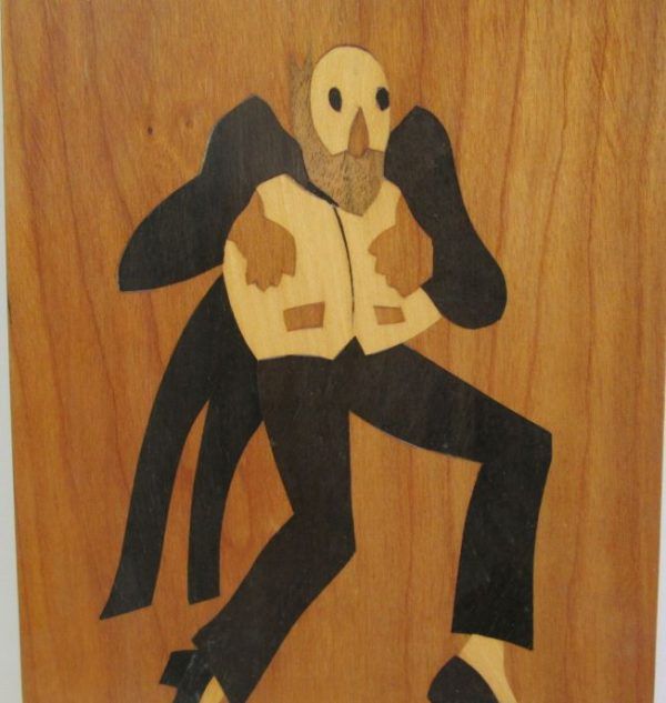 Wood Paintings Tuxedo Man in wood paint by thin layers of different kinds and colors of natural woods. A man wearing tuxedo.