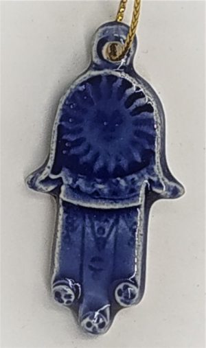 Small wall hanging Hamsa Khamsa blue glazed ceramic protection against the evil eye. Dimension 2.2 cm X 4.5 cm approximately.