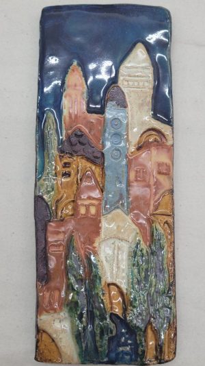 Handmade glazed ceramic tile rectangular Jerusalem houses city of Jerusalem with its different ages structures . Dimension 9 cm X 23 cm approximately.