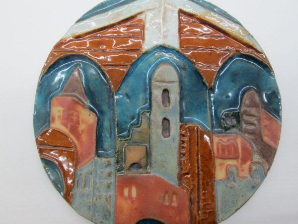 Handmade glazed ceramic tile Ruth Jerusalem houses round shape made by Ruth factor. Dimension diameter 14.5 cm approximately.