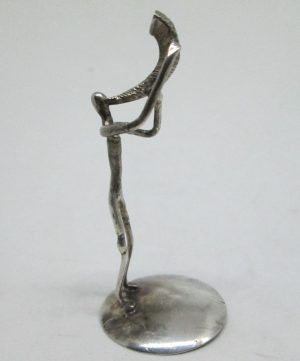 Handmade sterling silver miniature sculpture man blowing Shofar. Dimension diameter 2.7 cm X5.8 cm approximately.