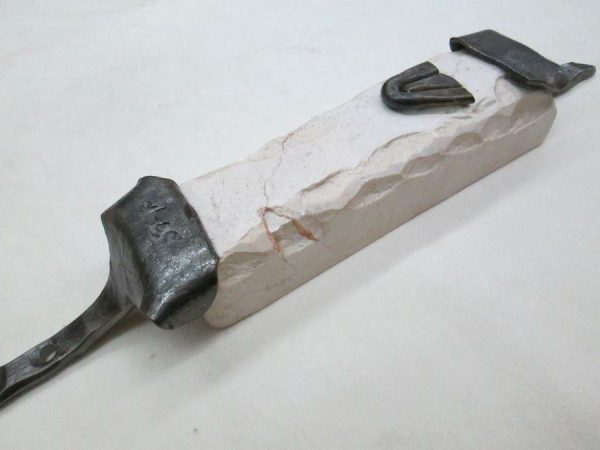 Contemporary Mezuzah Jerusalem carved stone with caste iron frame each Mezuzah is different because of the natural stone made by B. Dov.