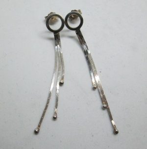 Contemporary style sterling silver earrings three chains, can not be altered to non pierced ear lobes. Dimension 0.8 cm X 5.3 cm approximately.