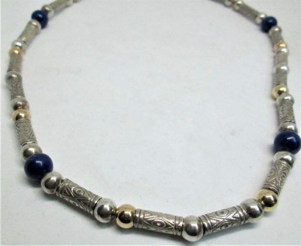 Necklace Silver Tubes Lapiz contemporary style. Handmade sterling silver & 14 carat gold beads choker necklace set with Lapis Lazuli beads.