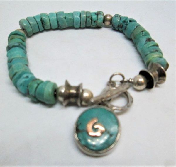 Sterling silver bracelet Turquoises silver beads, with semi precious Turquoises stone disks diameter 0.85 cm X 20 cm approximately.