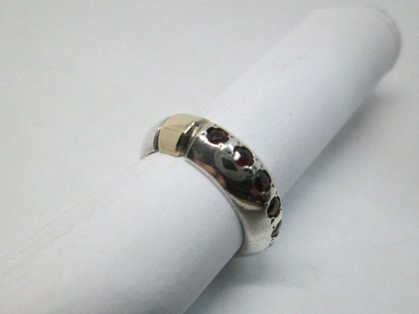 Handmade sterling silver ring six Garnet stones & 14 carat gold contemporary style ring. Dimension 0.65 cm ring size 50.