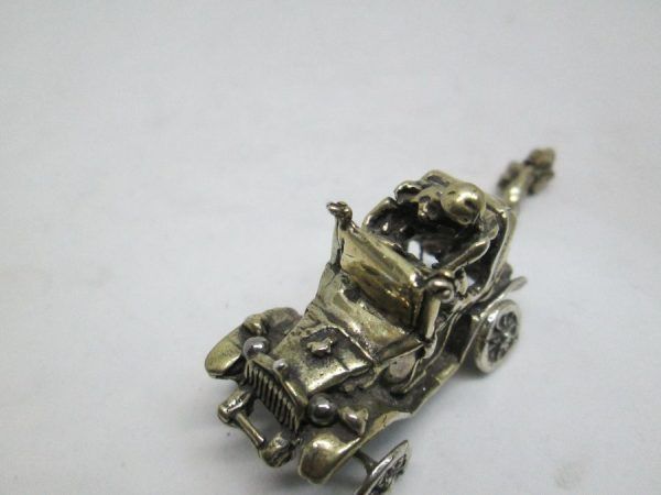Handmade sterling silver miniature sculpture of new wed couple car. Dimension 2.3 cm X 2.6 cm X 3.8 cm approximately.