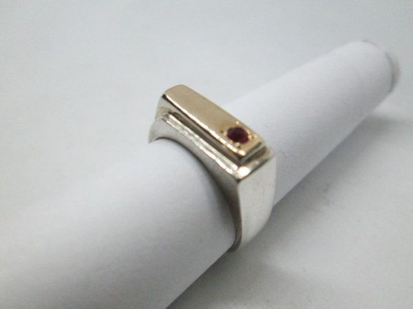Handmade sterling silver & 14 carat gold contemporary style Ruby stone ring silver. Dimension 0.65 cm X 1.6 cm ring size 52.