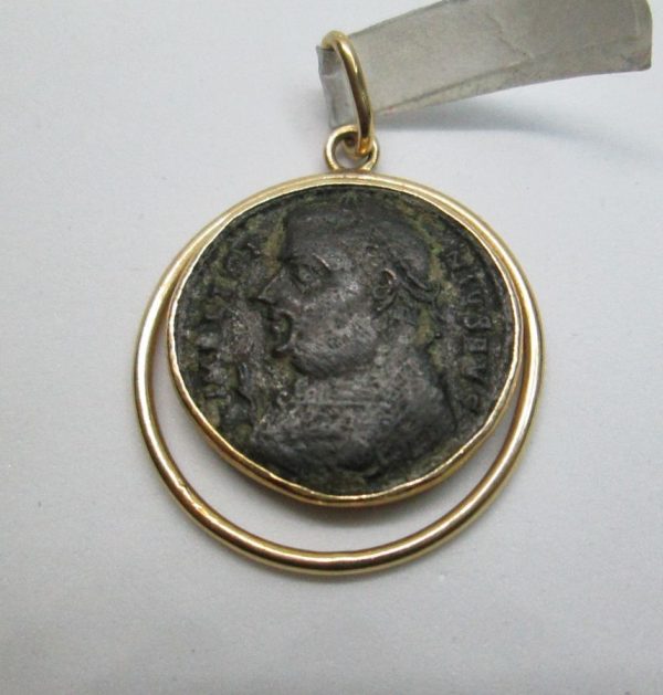 14 Carat gold antique Roman coin pendant with round wire around shape set with ancient genuine bronze Roman coin 3rd century AD.