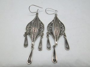 Handmade Yemenite filigree earrings with dangling drops Yemenite filigree. The hook can be changed to screw finding for non pieced ears by request.