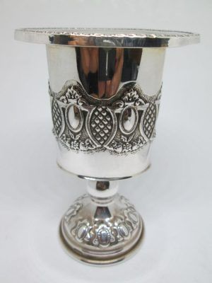Handmade sterling silver Havdalah candle holder pressed designs around candle holder.  Dimension 7.1 cm X 5.5 cm X 10.5 cm approximately.