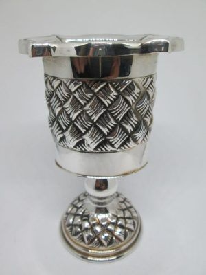 Handmade sterling silver Havdalah candle holder knot designs around candle holder. Dimension 6.7 cm X 4.6 cm X 10.4 cm approximately.