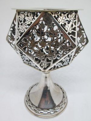 Handmade sterling silver Havdalah candle holder leaf with cut out all around candle holder. Dimension 8.7 cm X 4.7 cm X 12 cm approximately.