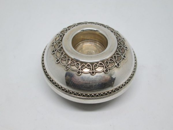 Sterling Silver handmade travelers Sabbath candle holders  with Yemenite filigree. Dimension Diameter 6.1 cm X 1.8 cm approximately.