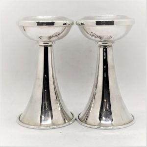 Sterling silver Sabbath candle holders handmade made by Bier for round flat Shabbat candles. Dimension Diameter 6.75 cm X 11.5 cm.