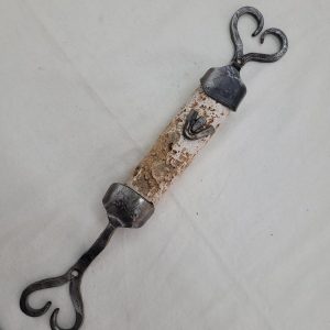 Contemporary Mezuzah raw Jerusalem stone carved stone with caste iron frame by B. Dov. Dimension 4.0 cm X 3.8 cm X 38cm approximately.
