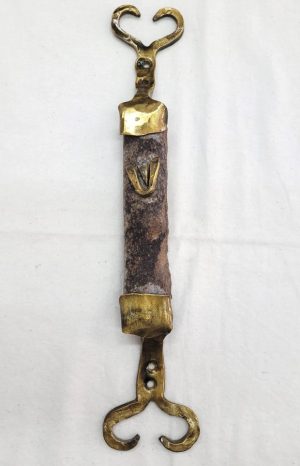 Contemporary designed carved Galilee stone Mezuzah with caste bronze frame by B. Dov. Dimension 4 cm X 3.8 cm X 35 cm approximately.