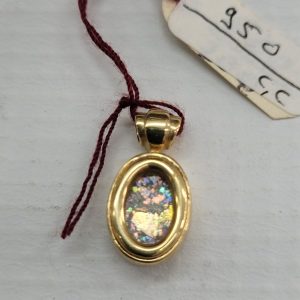 14 Carat Gold Pendant Roman Glass Oval. 14 carat gold oval pendant handmade set with ancient Roman glass. Dimension 0.9 cm X 1. 2 cm X 0.45 cm.
