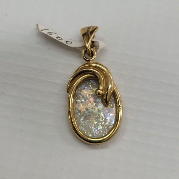 Handmade 14 carat gold pendant Roman glass oval shape set with genuine ancient Roman glass. Dimension 1.4 cm X 2.1 cm X 0.55 cm approximately.