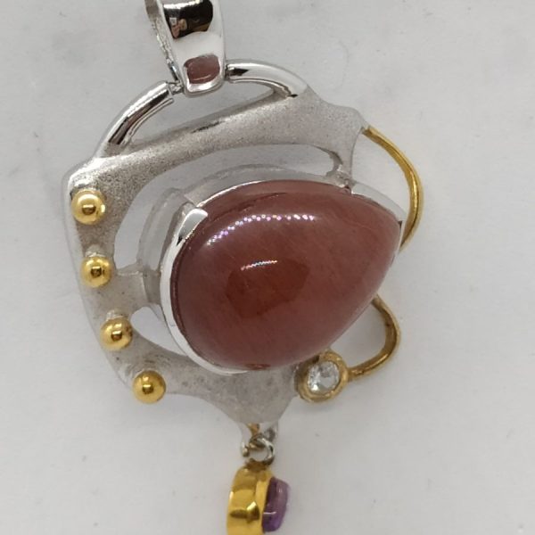 Handmade sterling silver and gold contemporary Carnelian Amethyst pendant set with brown cabochon Carnelian stone and Amethyst.