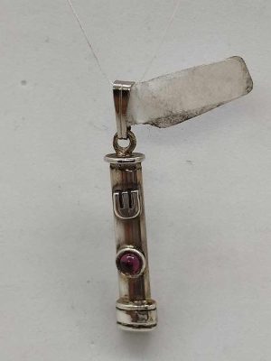 Handmade sterling silver Mezuzah pendant Garnet stone set in center made by S. Ghatan(Katan). Dimension 0.5 cm X 0.27 cm X 2.2 cm approximately.