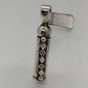 Handmade sterling silver Mezuzah pendant round shape made by S. Ghatan(Katan) with elaborate Yemenite filigree 0.75 cm X 0.6 cm X 2.5 cm approximately.