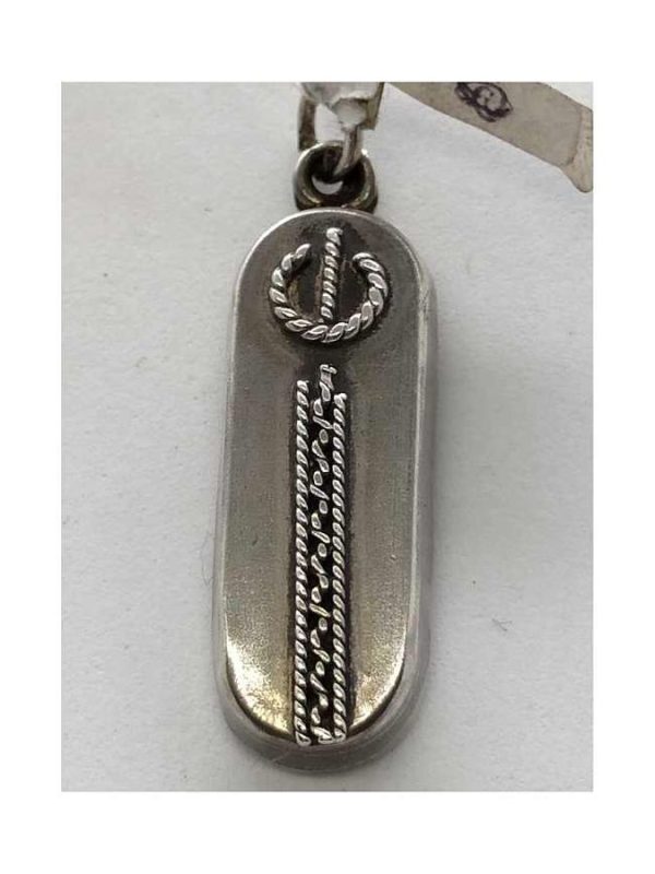 Sterling silver Mezuzah pendant ellipse filigree handmade with Yemenite filigree. Dimension 1 cm X 0.6 cm X 2.6 cm approximately.