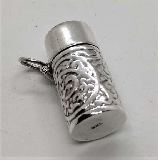 Sterling silver Mezuzah pendant container mini with open lid to insert in your private parchment with designs embossed all around it.