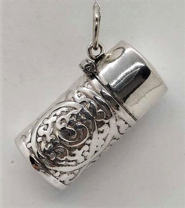 Sterling silver Mezuzah pendant container mini with open lid to insert in your private parchment with designs embossed all around it.